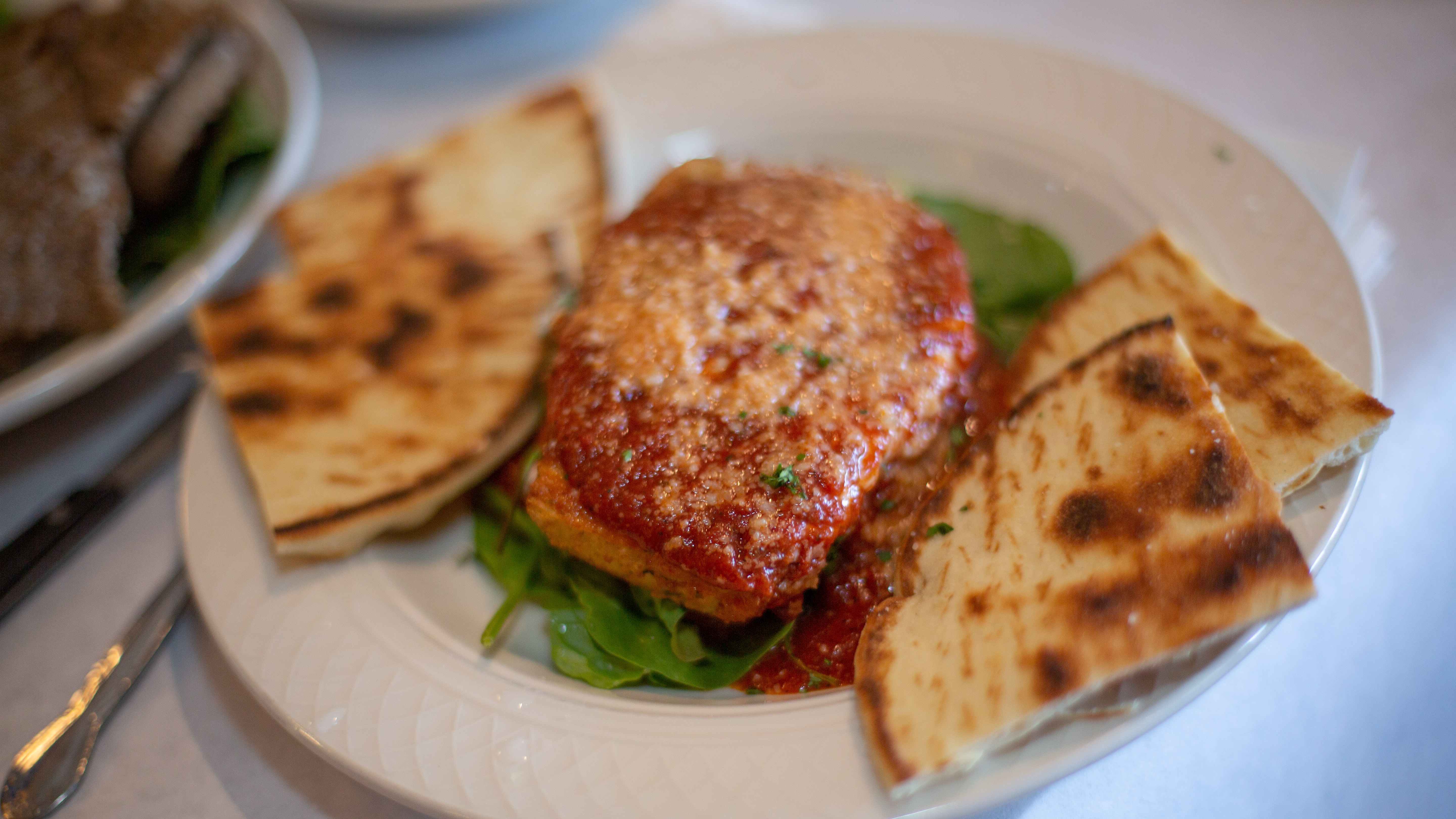 Eggplant Sorrell with Small Caesar Salad and Pita Bread
