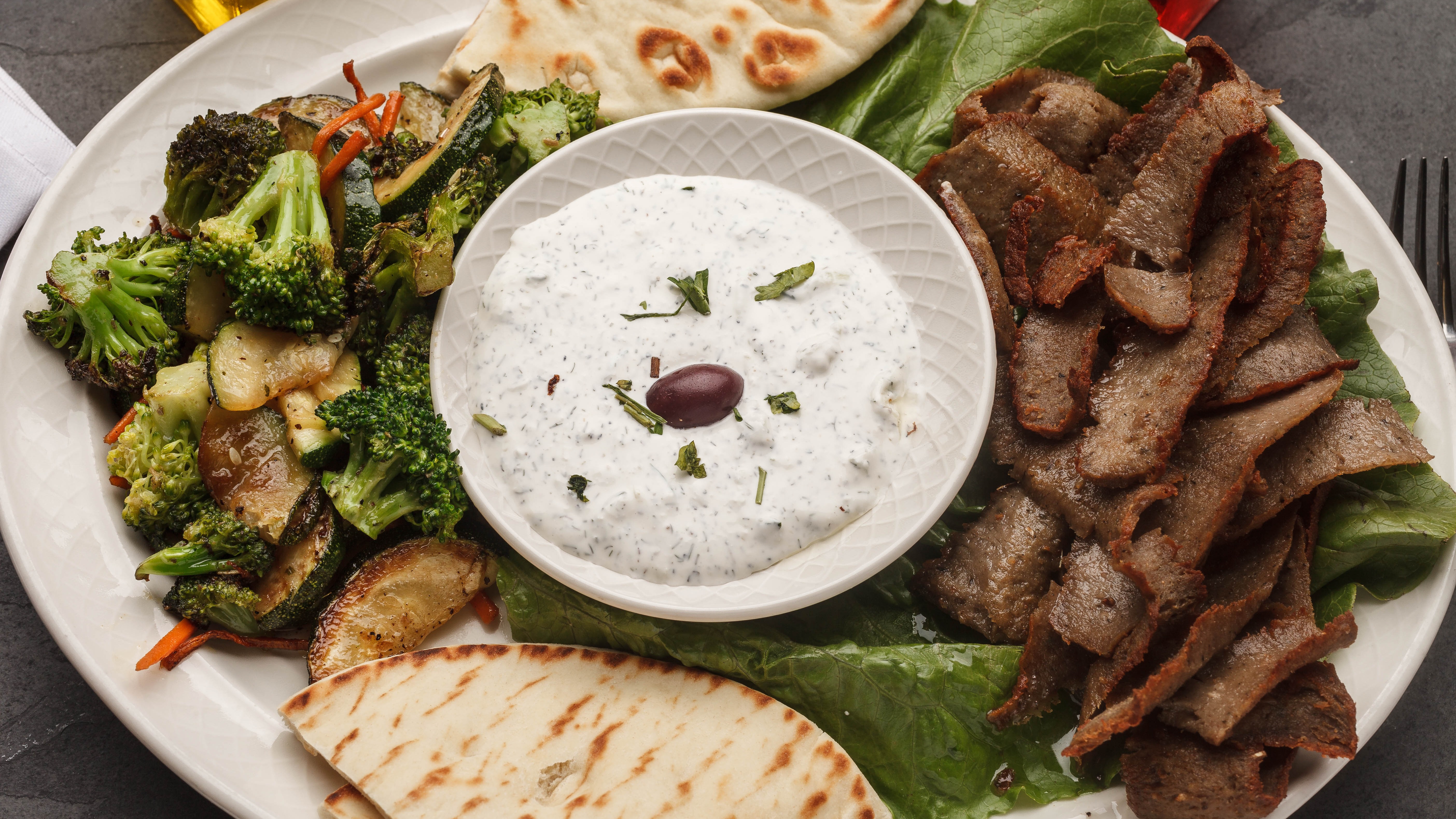Gyros Platter with Small Caesar Salad and Pita Bread