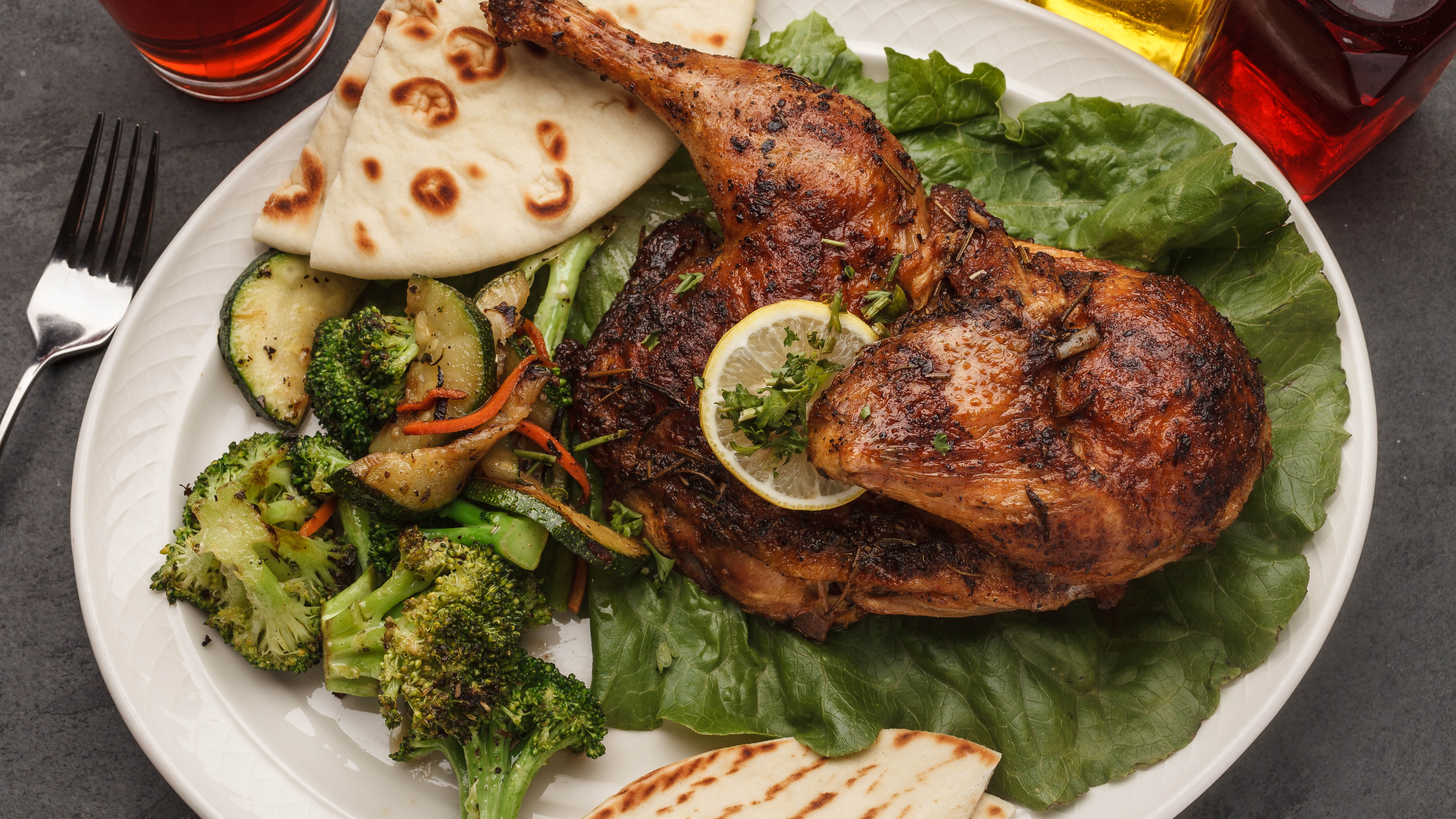 Roasted Chicken with Small Caesar Salad and Pita Bread