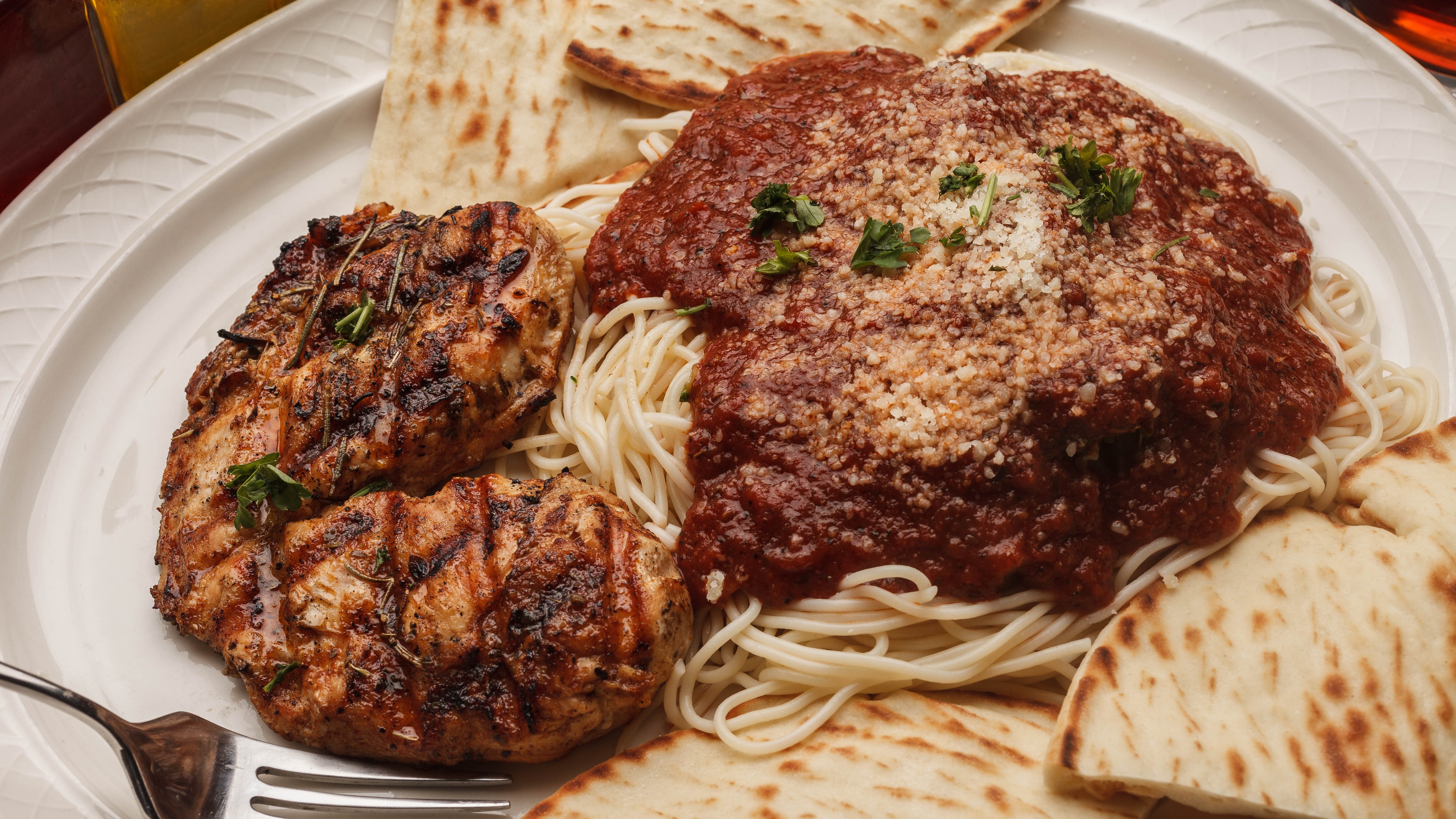 Rosemary Filet of Chicken with Small Caesar Salad and Pita Bread