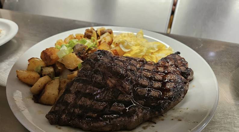 Ribeye Steak and Three Eggs