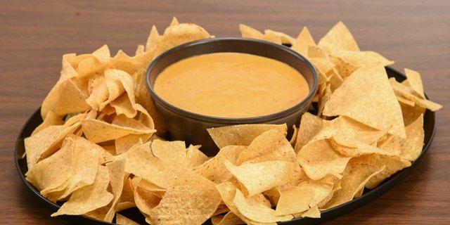 Chips and Spicy Cheese Sauce