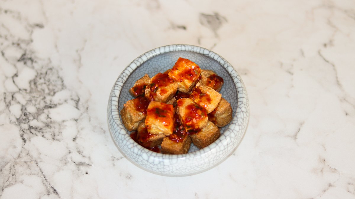 36. Fried Tofu with herb sauce (spicy)