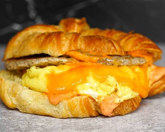 Croissant, Sausage, Egg, and Cheddar