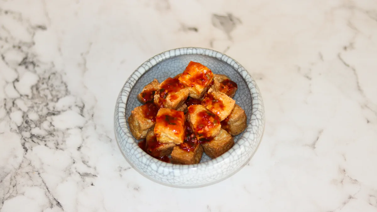 36. Fried Tofu with herb sauce (spicy)
