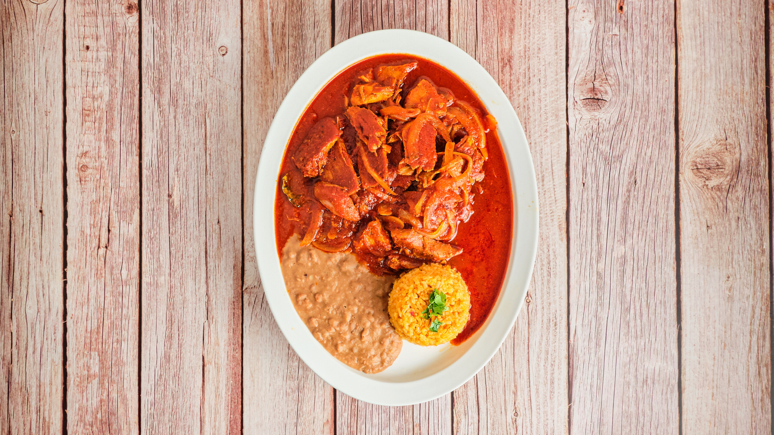 Carnitas en Salsa Roja