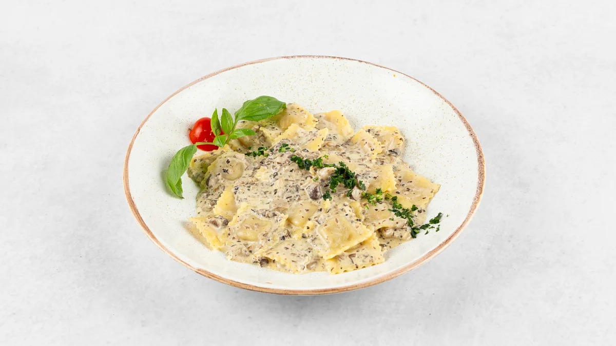 Ravioli con pollo e porcini