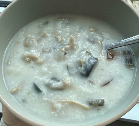 Salted Pork W. Thousand Year Egg Congee 皮蛋瘦肉粥
