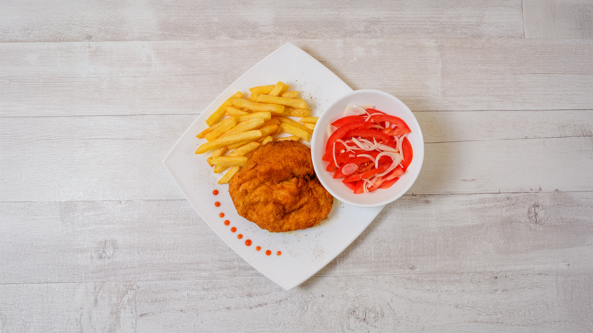 Snitel din piept de pui + Garnitura la alegere