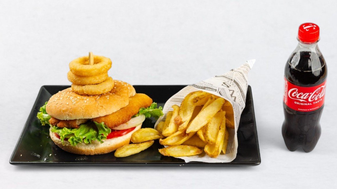 Burger with fried chicken with french fries, onion rings and Coca-Cola 0.5 l