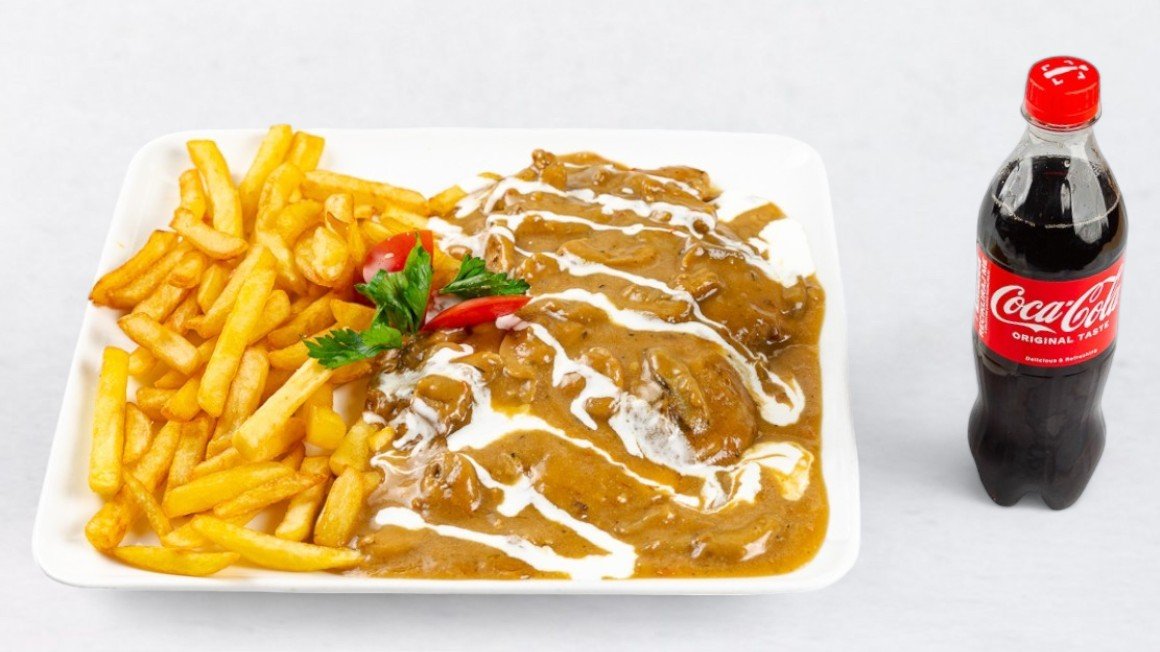 Steak in mushroom sauce with french fries and Coca-Cola 0.5 l