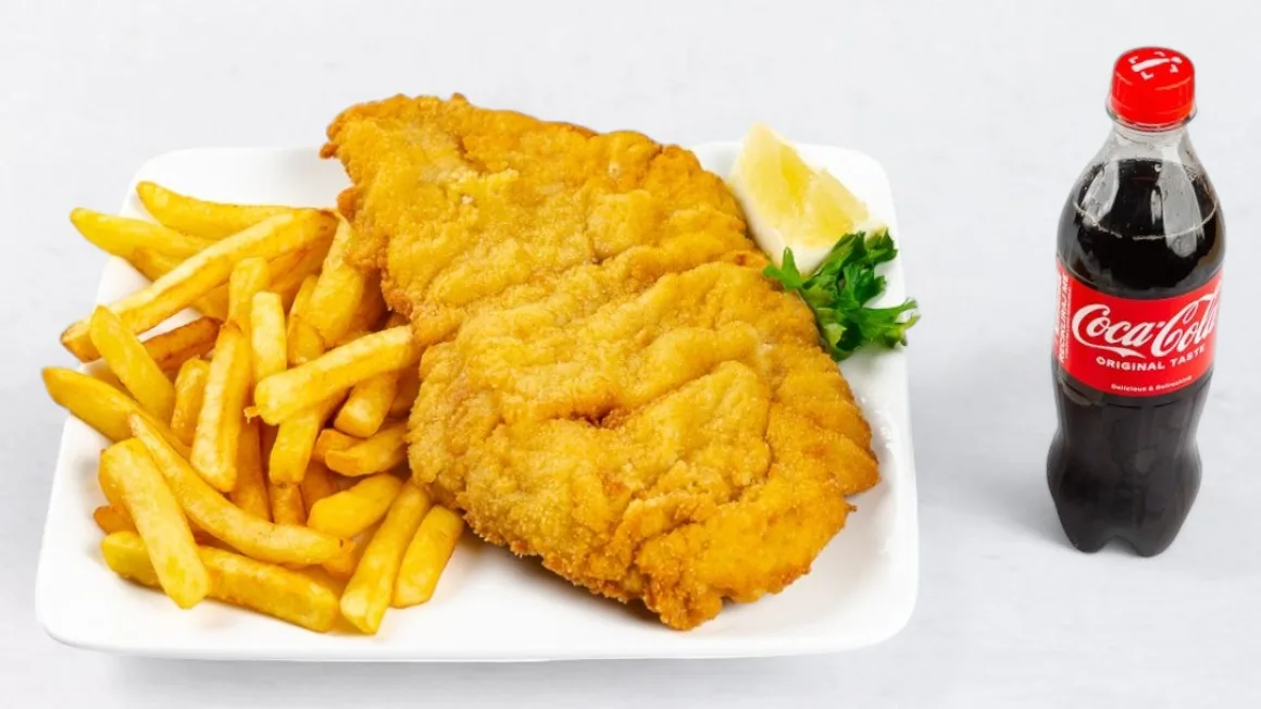 Wiener schnitzel with french fries and Coca-Cola 0.5 l