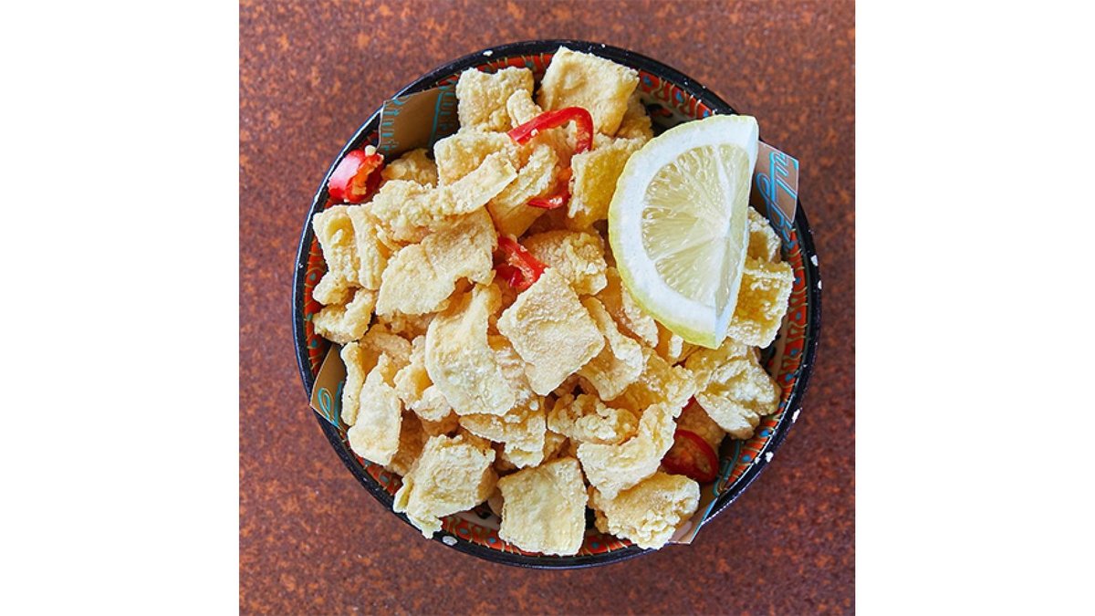 Calamari with a zing served with lemon, salt and chilli