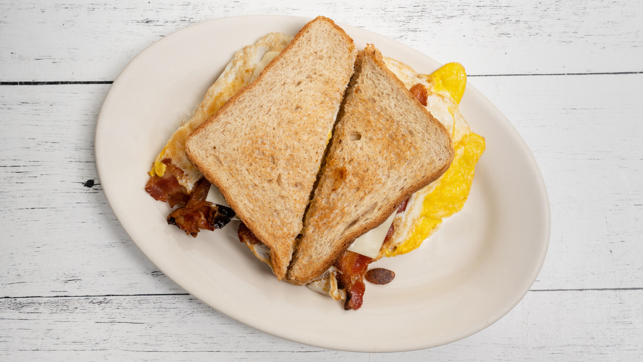 Egg, Cheese, and *Bacon, Sausage or Ham