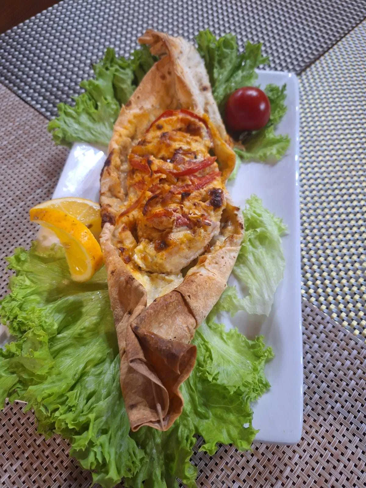 The signature dish is chicken fillet in lavash