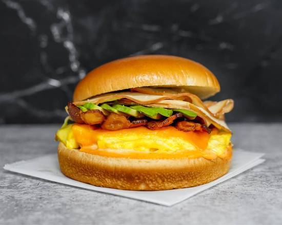 Brioche, Bacon, Turkey, Avocado, Egg, and Cheddar
