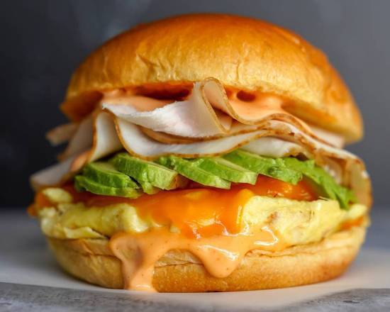 Brioche, Smoked Turkey, Avocado, Egg, and Cheddar