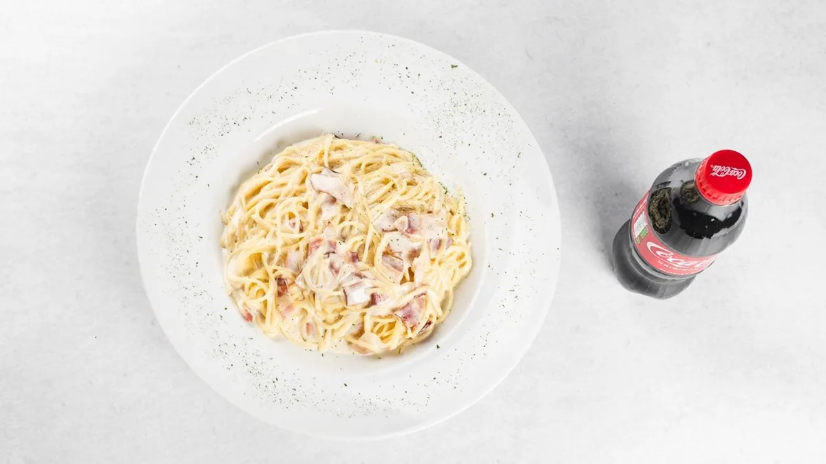 Spaghetti carbonara and Coca-Cola 0.5 l