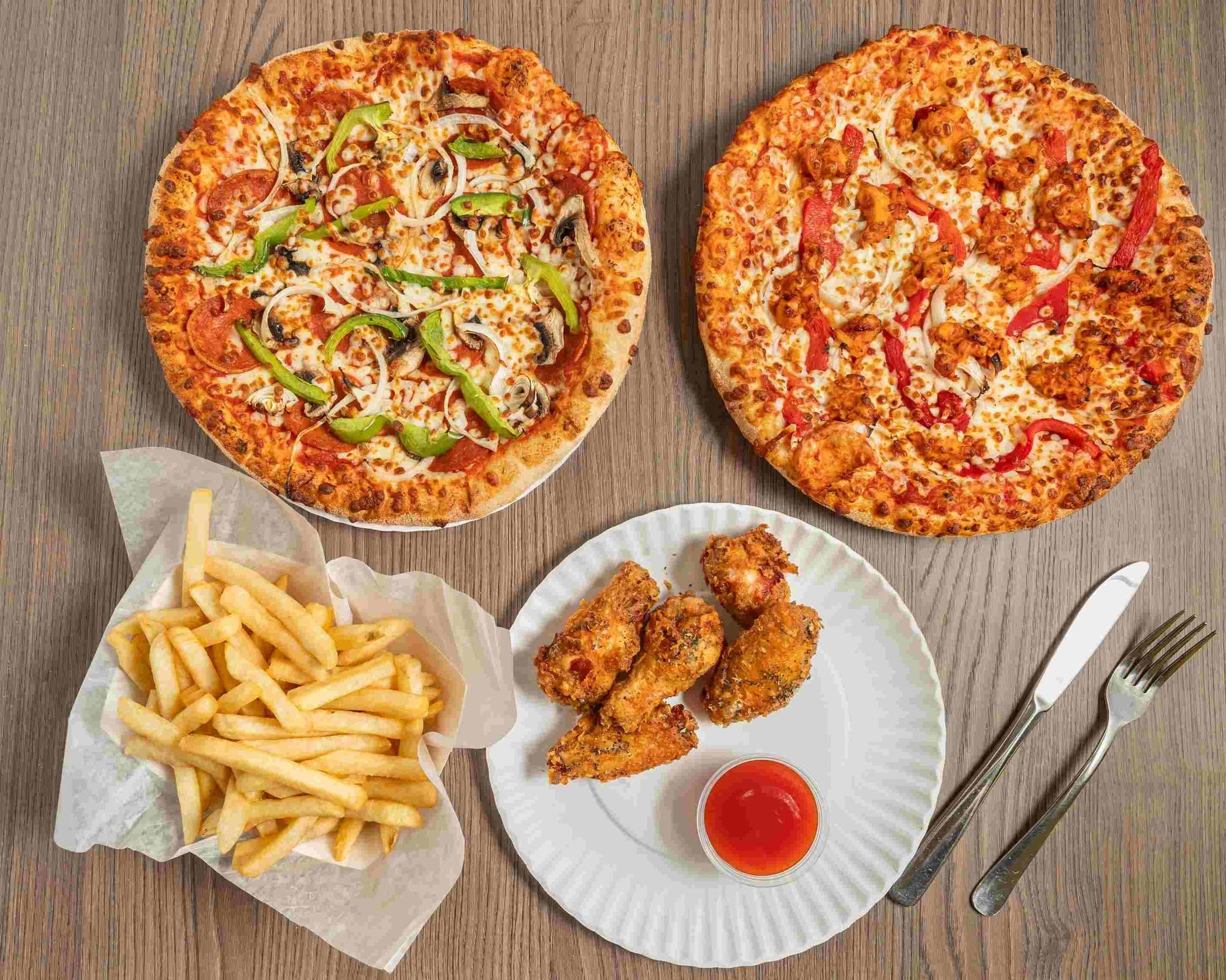 Buy One Get One Deal - 2 Pizzas (Choose Up To 4 Toppings)
