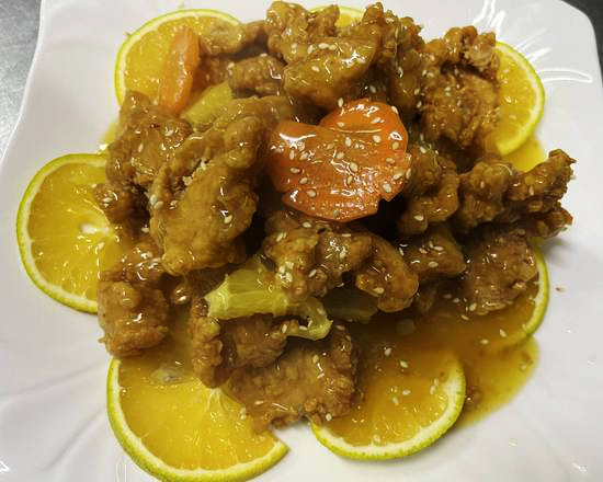 68.Trozos de Pollo en Salsa Naranja