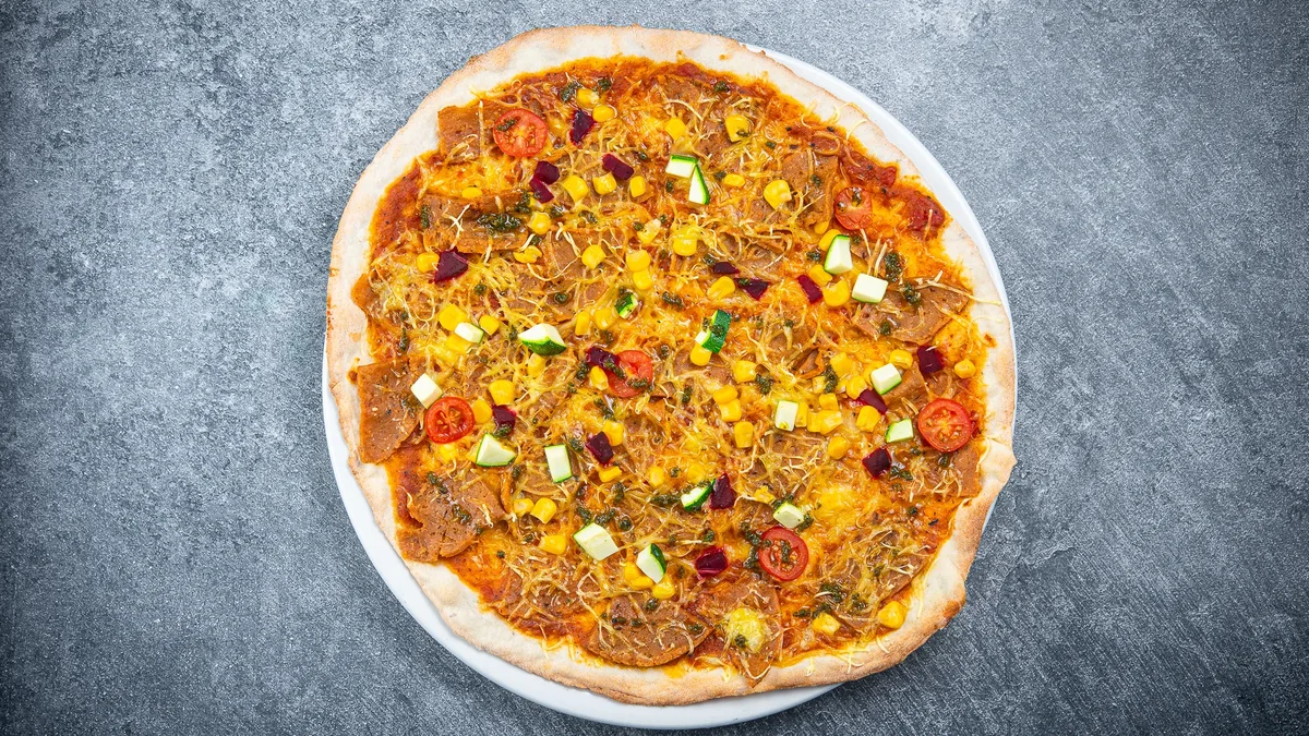 Vegan pizza with tomatoes sauce 32