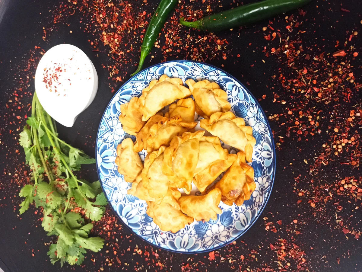 Fried Vareniki with cabbage and cream
