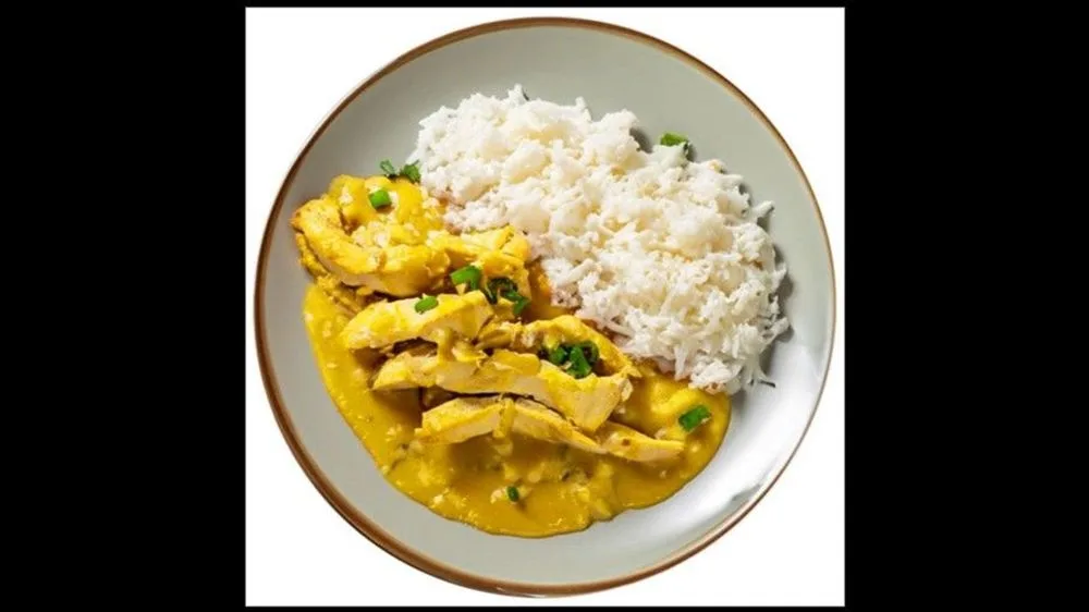 Hähnchenbruststreifen mit Sauce Hollandaise mit extra viel Fleisch dazu Wildreis.