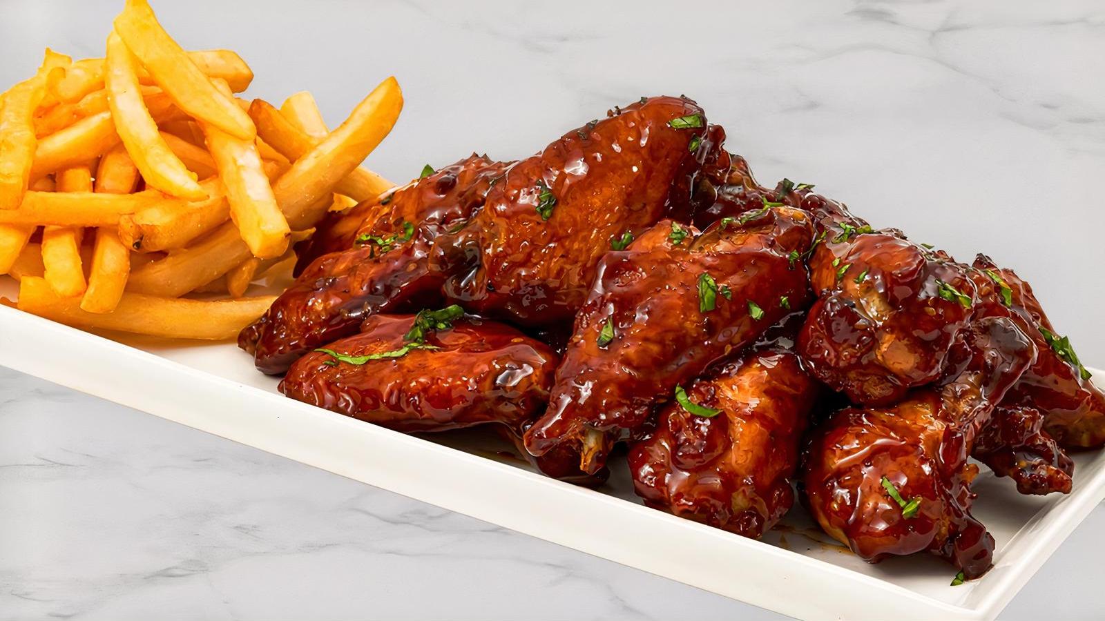 12 Piece Bone-In Or Boneless Wings with Fries!