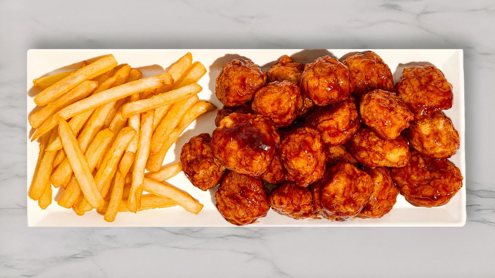 16 Piece Bone-In Or Boneless Wings with Fries!
