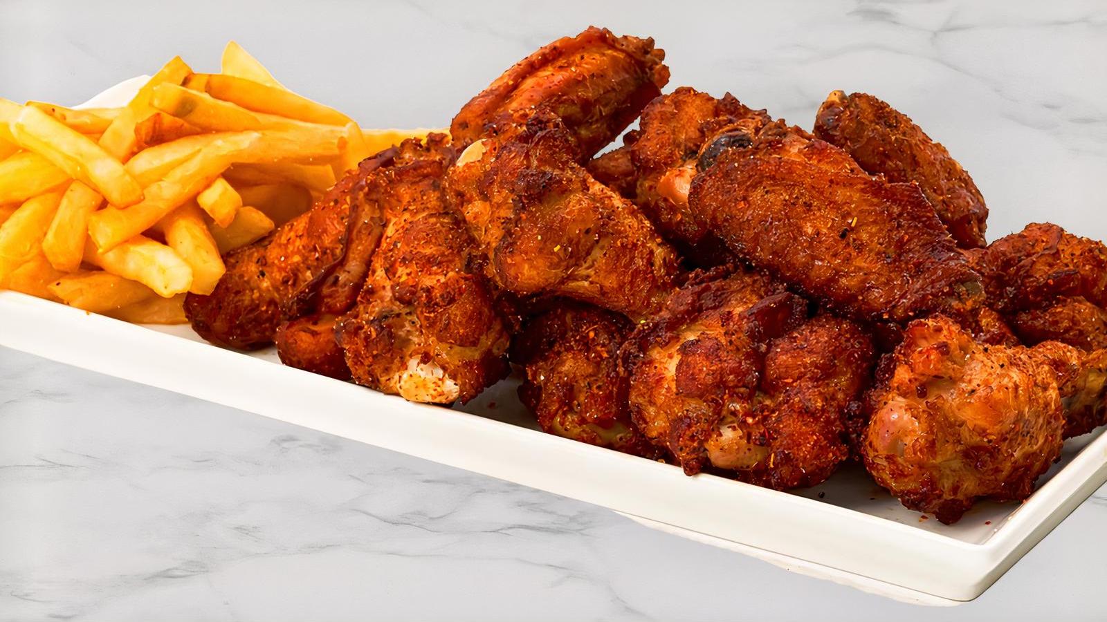 32 Piece Bone-In Or Boneless Wings with Fries!