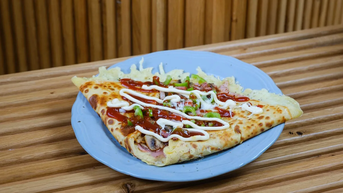 Ham, Cheese, Bacon, Pizza Sauce, Mushrooms, Onion, Green Pepper, Ketchup, Mayo
