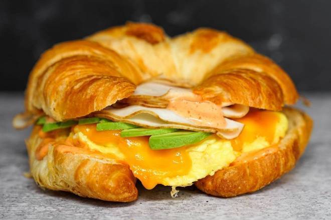 Croissant, Smoked Turkey, Avocado, Egg, and Cheddar