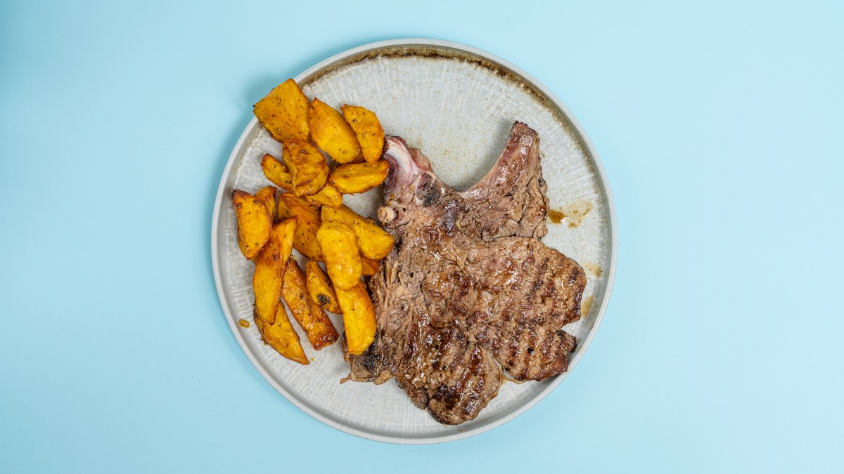Beef Chops with Baked Potatoes