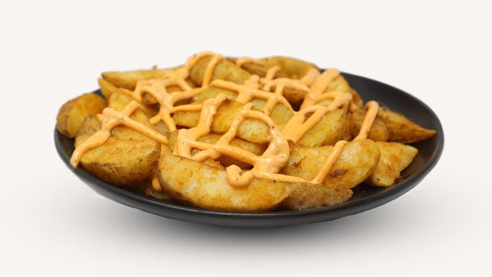 Potatoes with mexican sauce