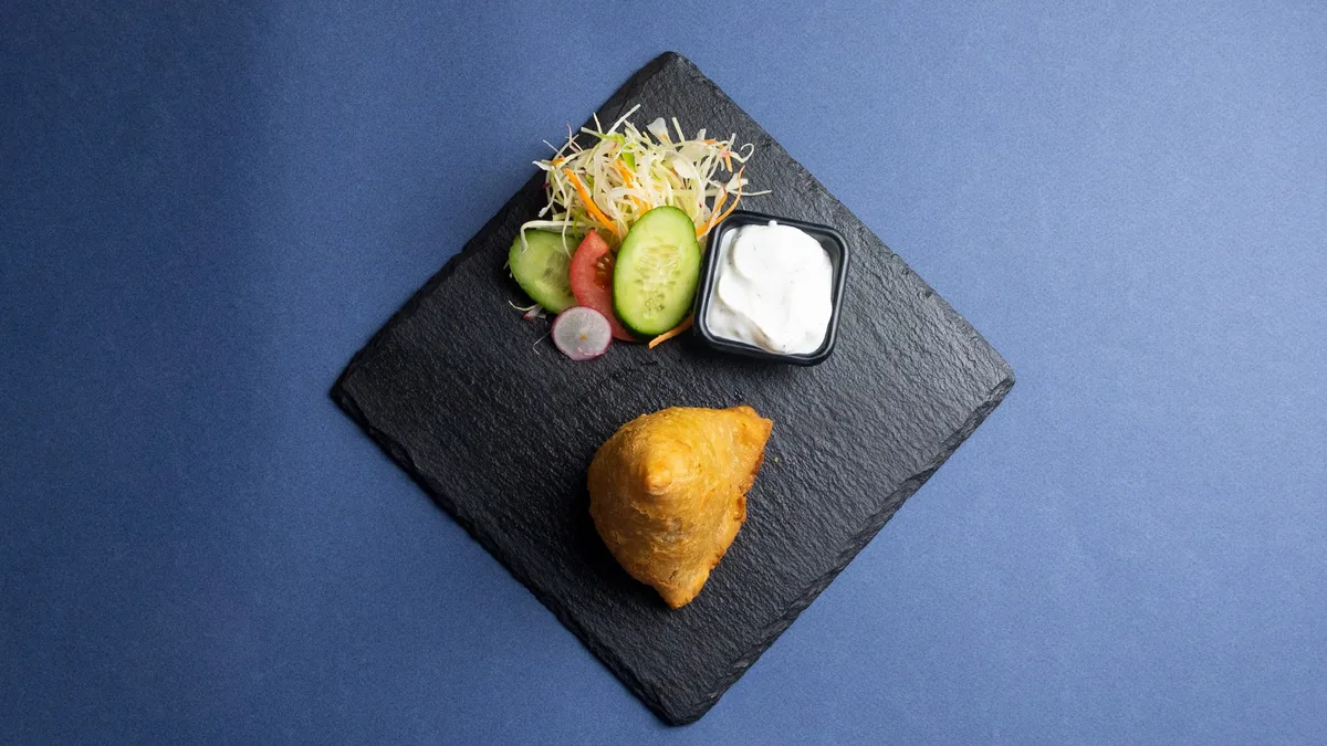109. Meat Samosas (1pc)