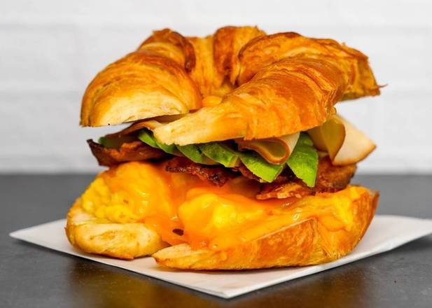 Croissant, Bacon, Turkey, Avocado, Egg, and Cheddar