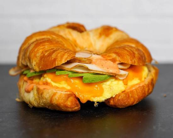 Croissant, Smoked Turkey, Avocado, Egg, and Cheddar