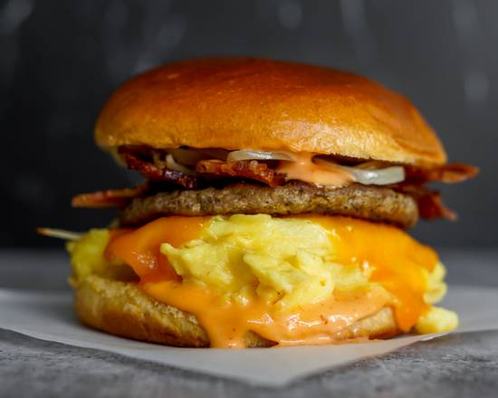 Brioche, Turkey Bacon, Turkey Sausage, Egg, and Cheddar