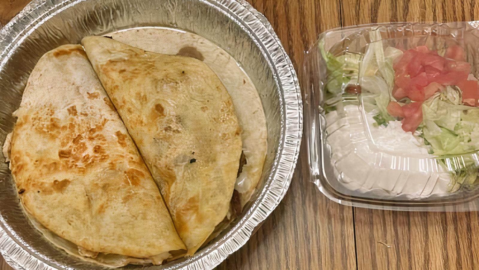 28. Quesadillas Mexicanas ( steak and grilled chicken)