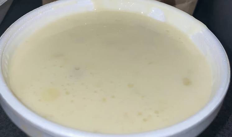 8.OZ Cheese Sauce and Chips/QUESO Y TOTOPOS