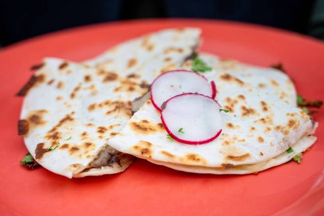 Nino Quesadilla with Frijoles