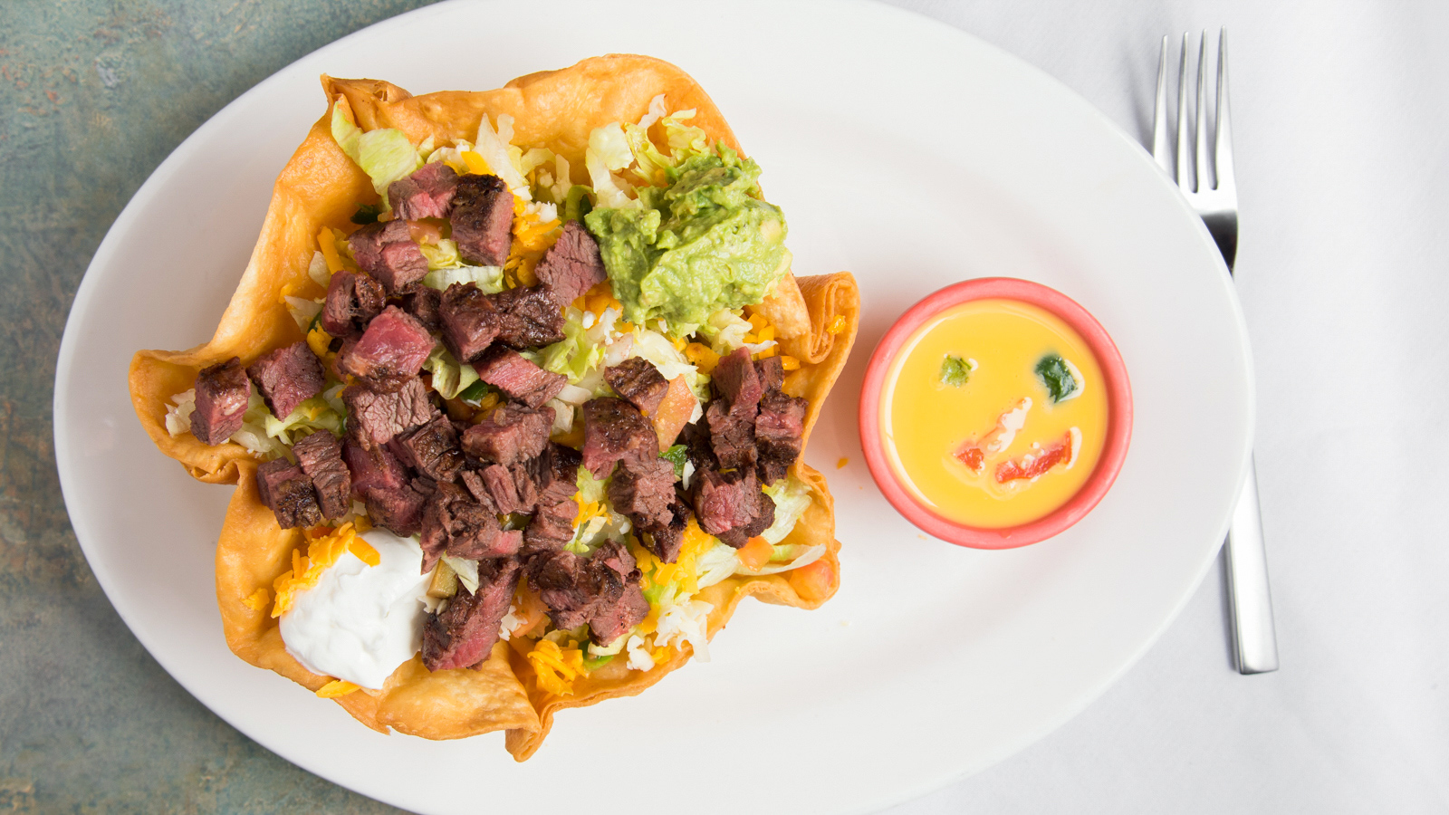 Salad with Fajita Beef taco shell
