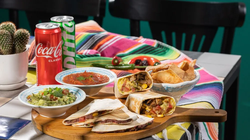 Chicken Combo: Burrito, Quesadilla, Red Salsa, Guacamole Chips and 2 Free Drinks