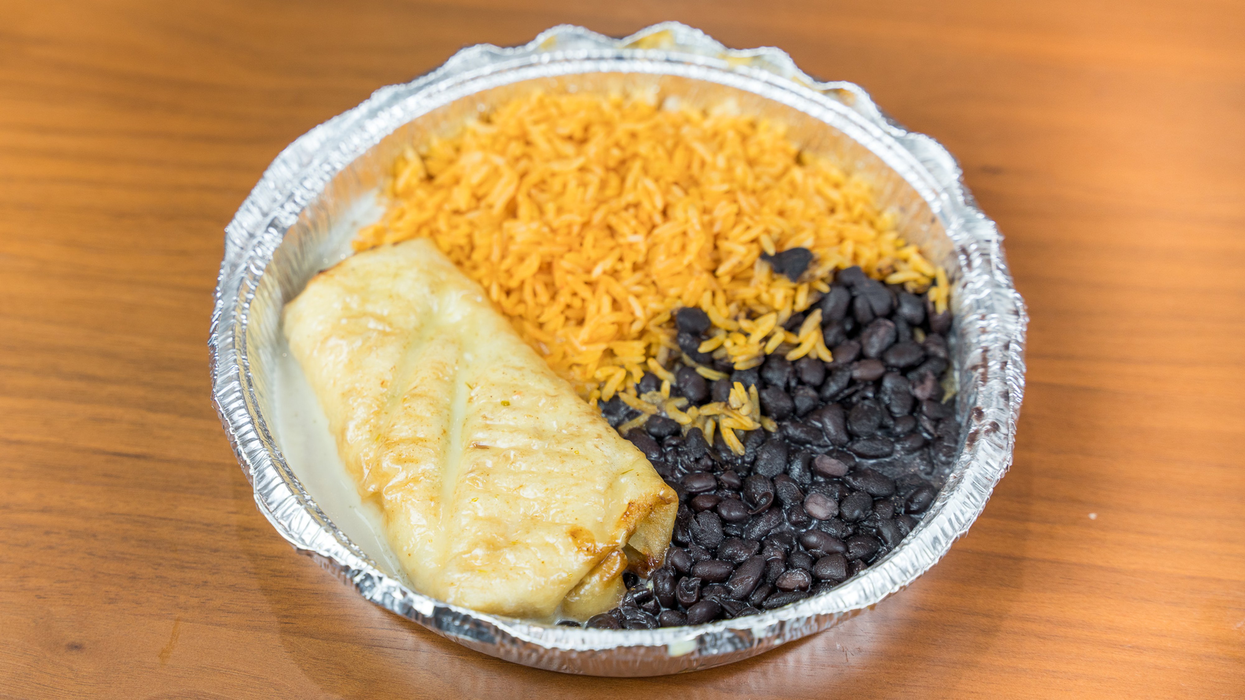 12. One Chimichanga, One Taco, Rice and Black Beans