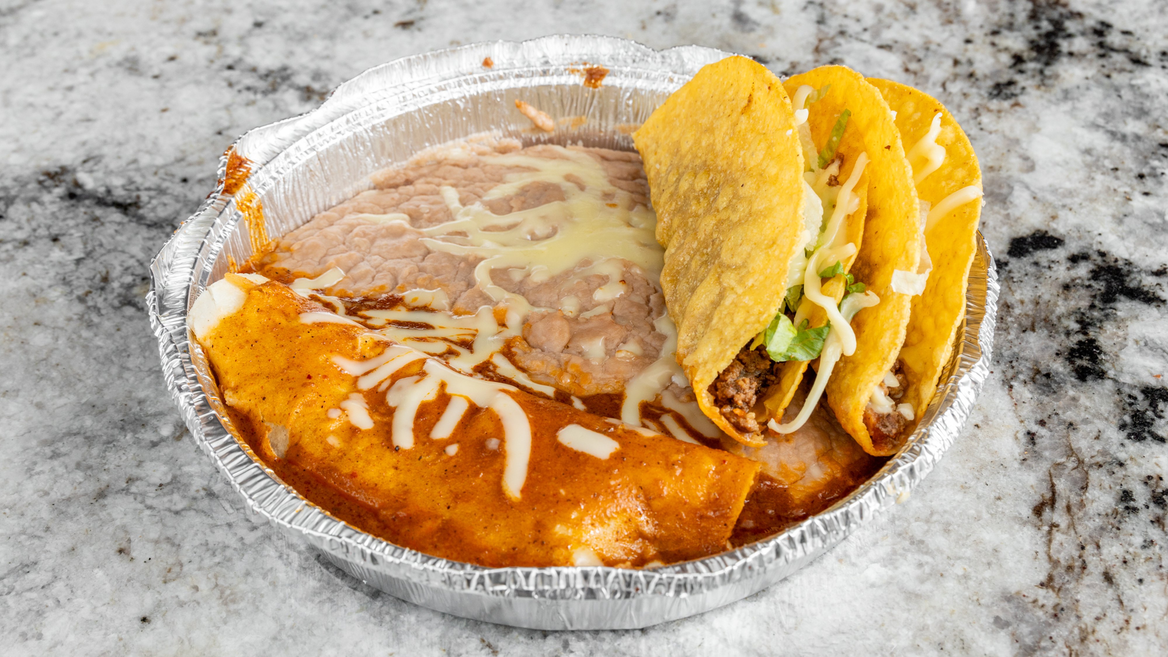 4. Two Tacos, One Enchilada and Refried Beans