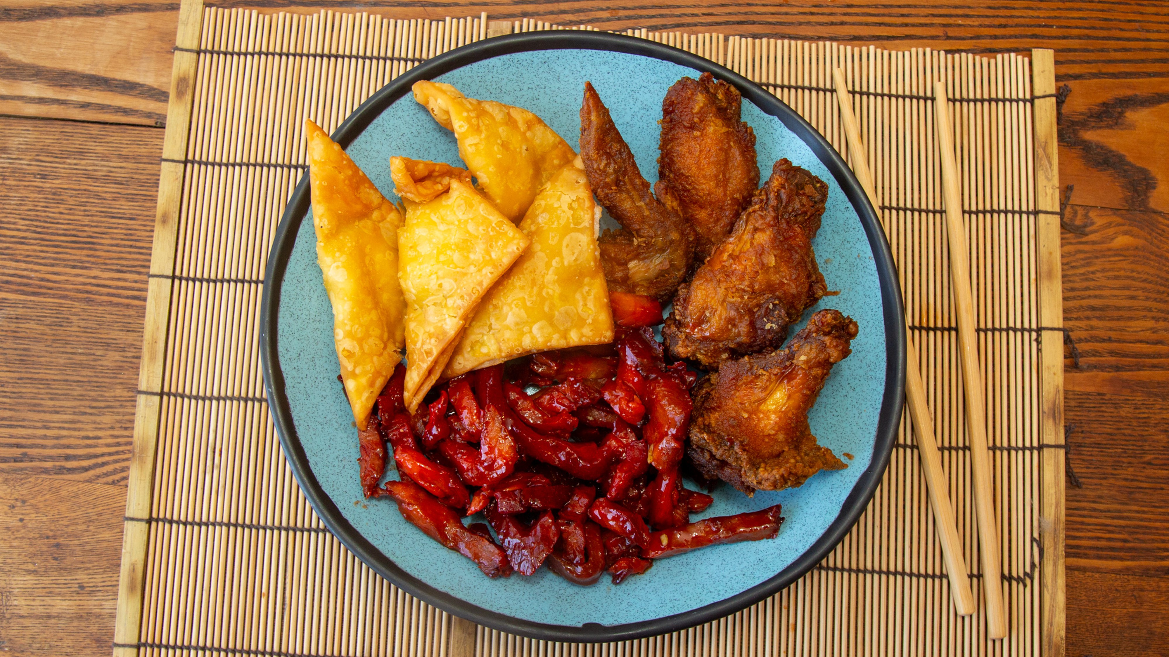 30. Crab Rangoon (4), Boneless Spare Ribs, Chicken Wings (4)