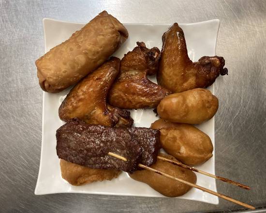 Egg Roll (1 pc), Chicken Wings (3 pcs), Chicken Fingers (6 pcs), and Beef Teriyaki (2 pcs)