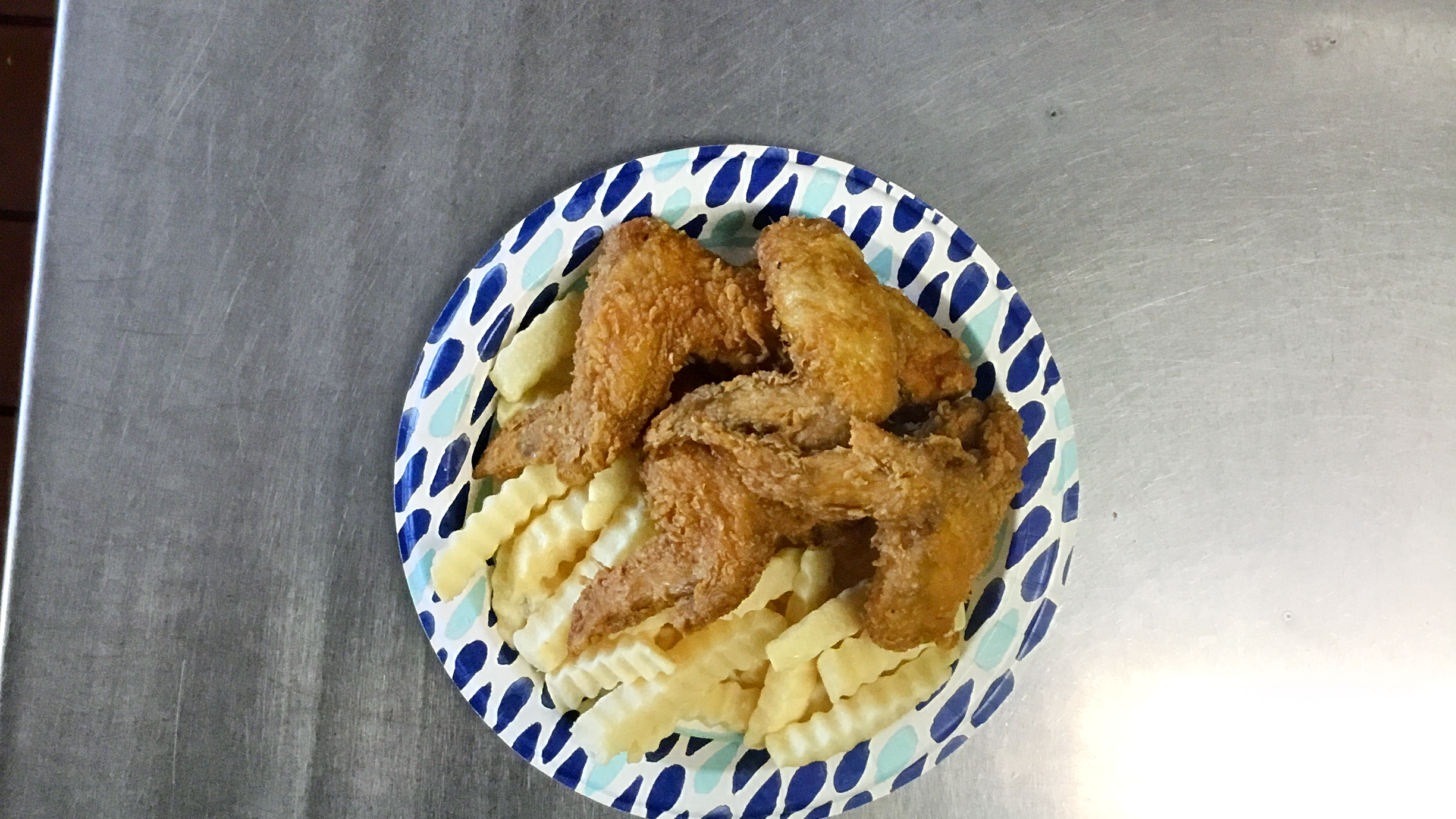 Chicken wing andFrench Fries