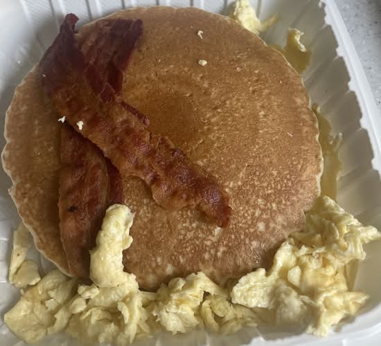 Hotcakes and Two Eggs with Two Bacon