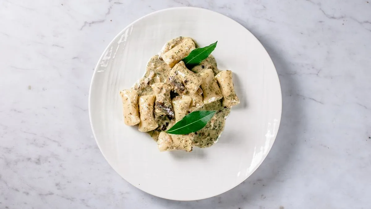 Delicious gnocchi with smoked trout and fennel in a cream sauce